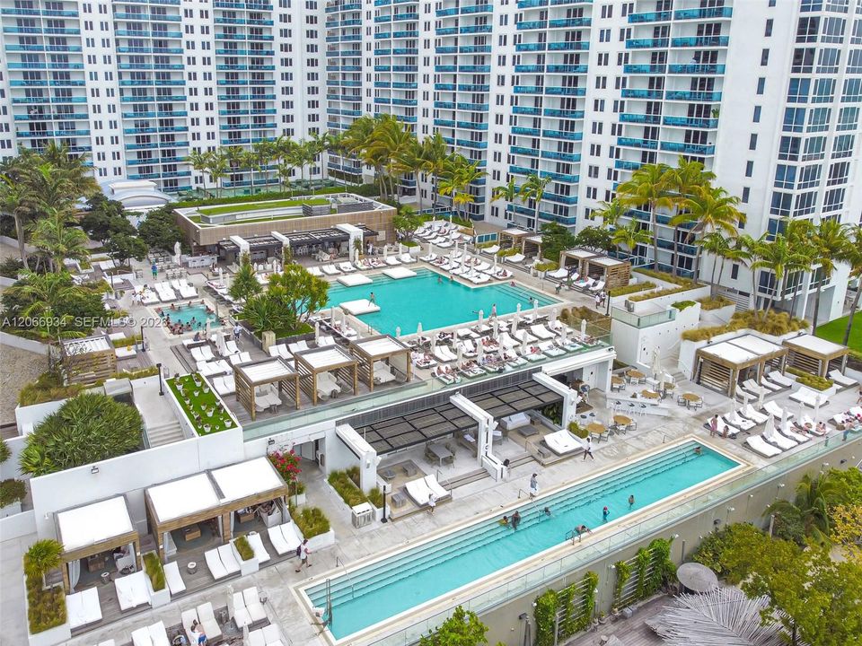 3 oceanfront heated pools with complimentary chair, towel, umbrellas.  Food & Beverage service too!