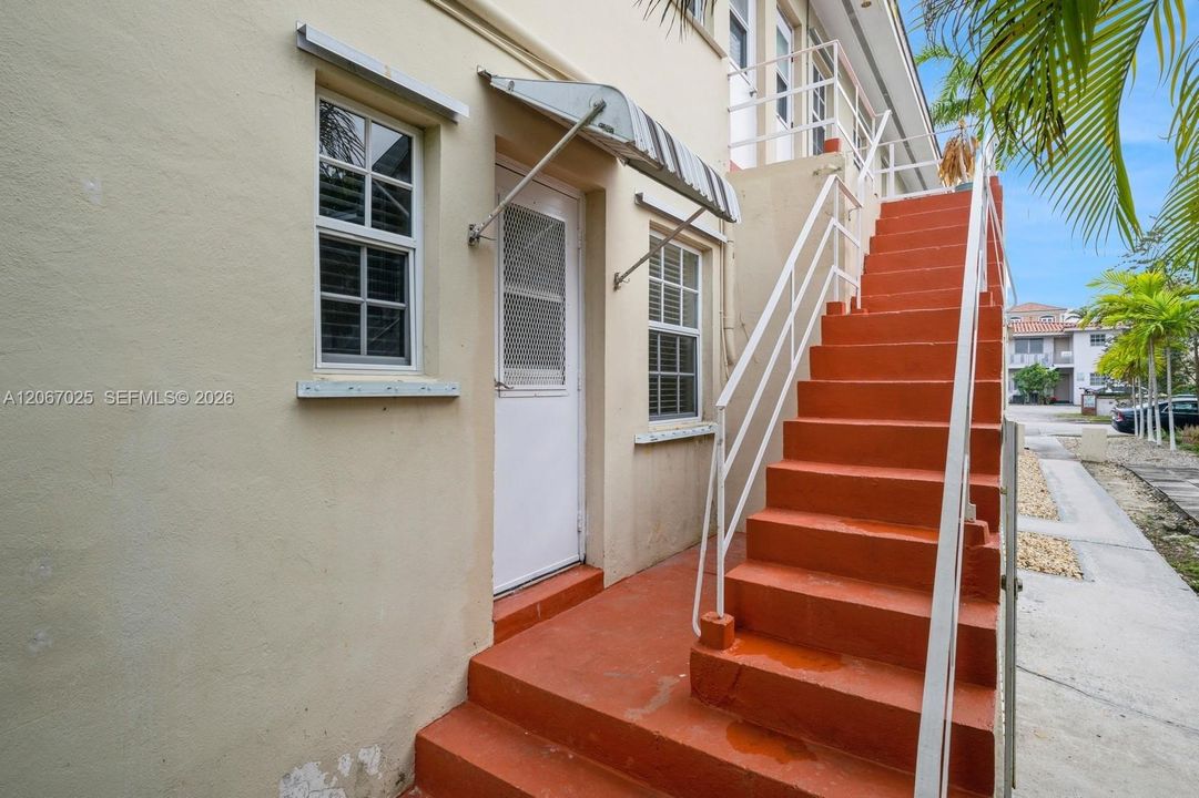 Back door to apt #2.