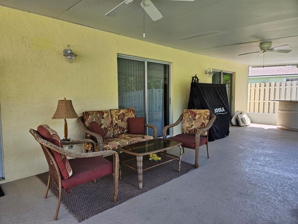 patio seating and ping pong table
