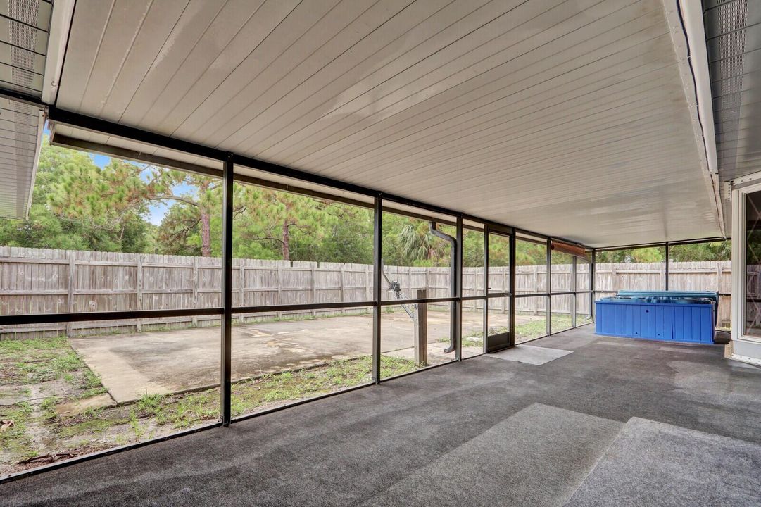 Fenced area with concrete patio