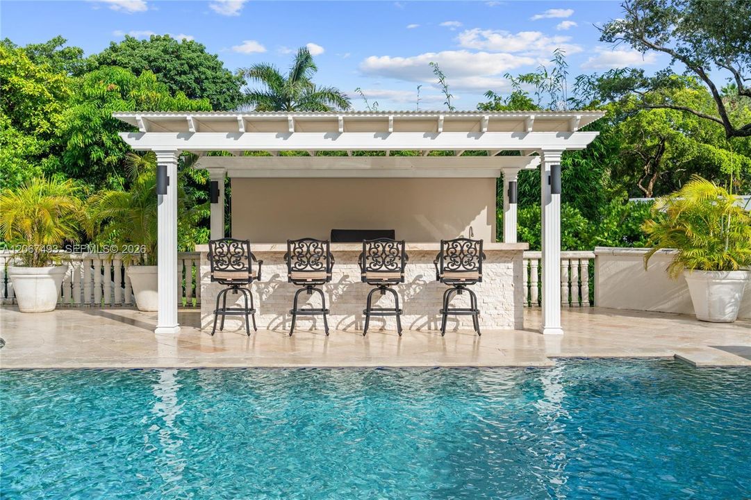 20'x40' with waterfall, gazebo with 4-person bar, built-in grill, refrigerator, ice maker, storage