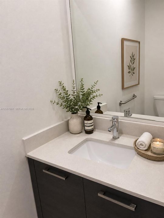 staged half bath, downstairs