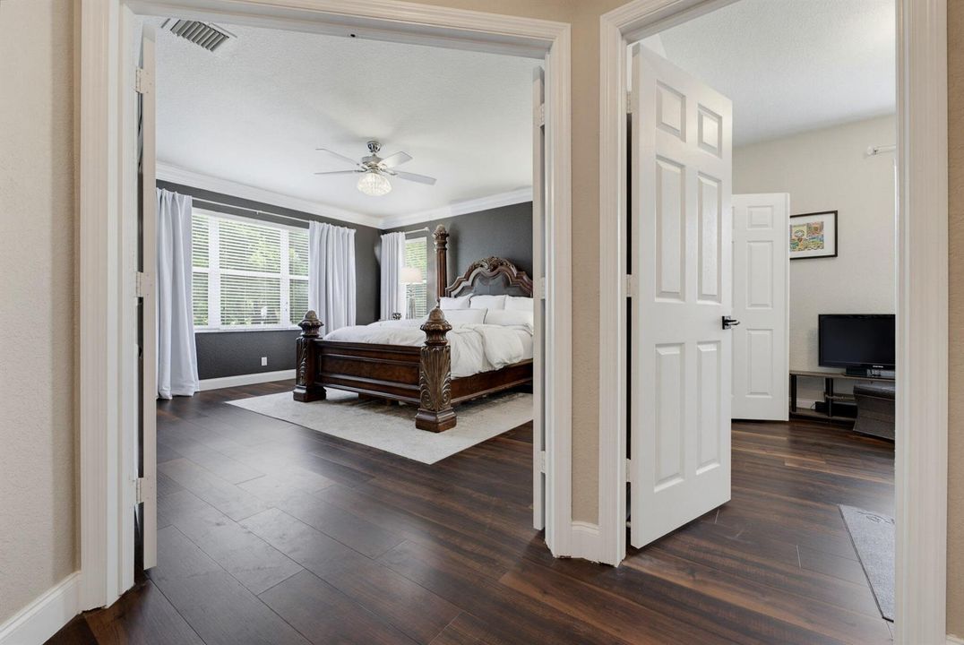 Hallway to Primary & Bedroom 2