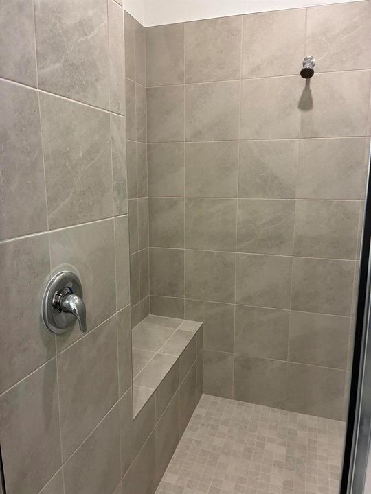 Walk in shower w seat master bath