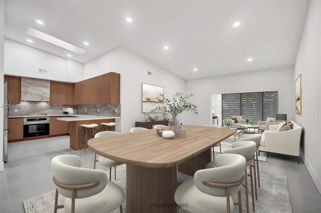 Virtually staged to show living room dining room.