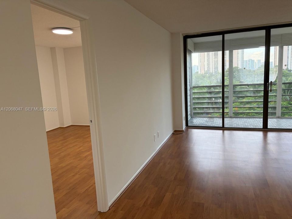 Living room and entrance to bedroom