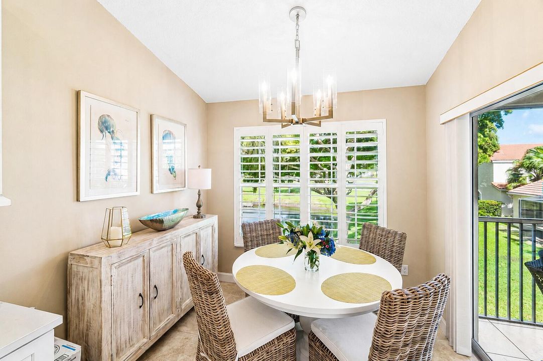 Eat-in kitchen with golf and lake view