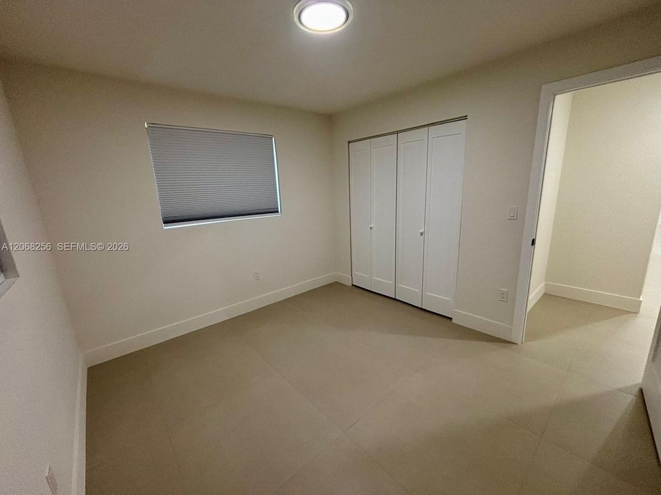 Bedroom 2 -10.9ft  (north/south) x 9.6 ft  (east/west)