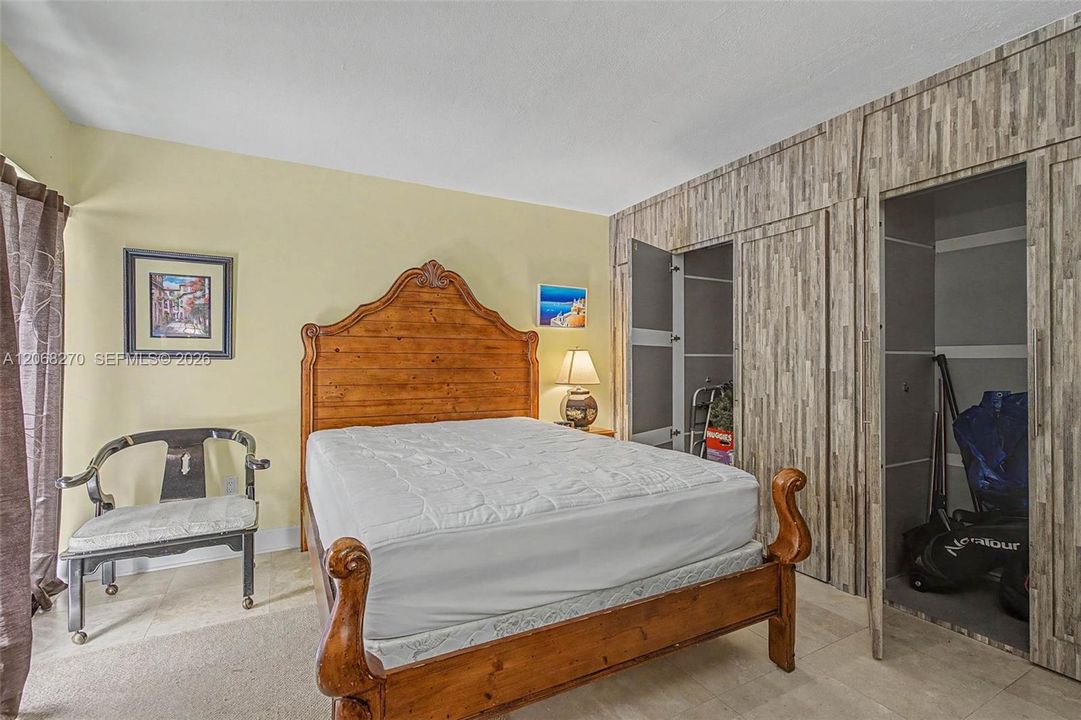 2nd bedroom with closets open