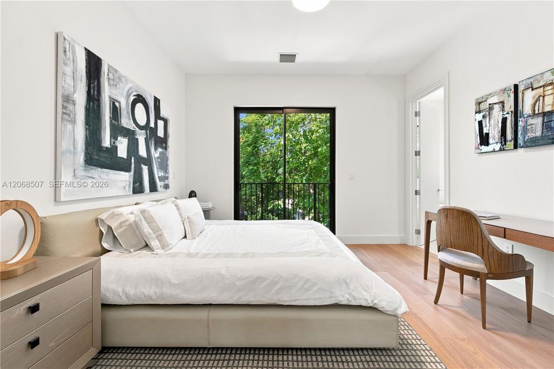 East exposure with private balcony overlooking the pool and backyard
