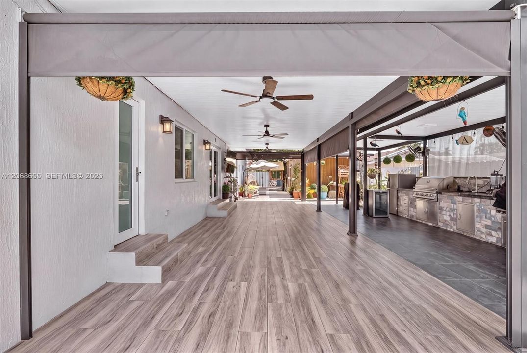 Back yard Terrace has Motorized Shades