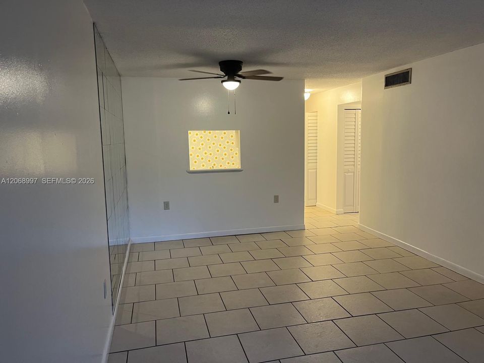 Freshly painted with new ceiling fan.