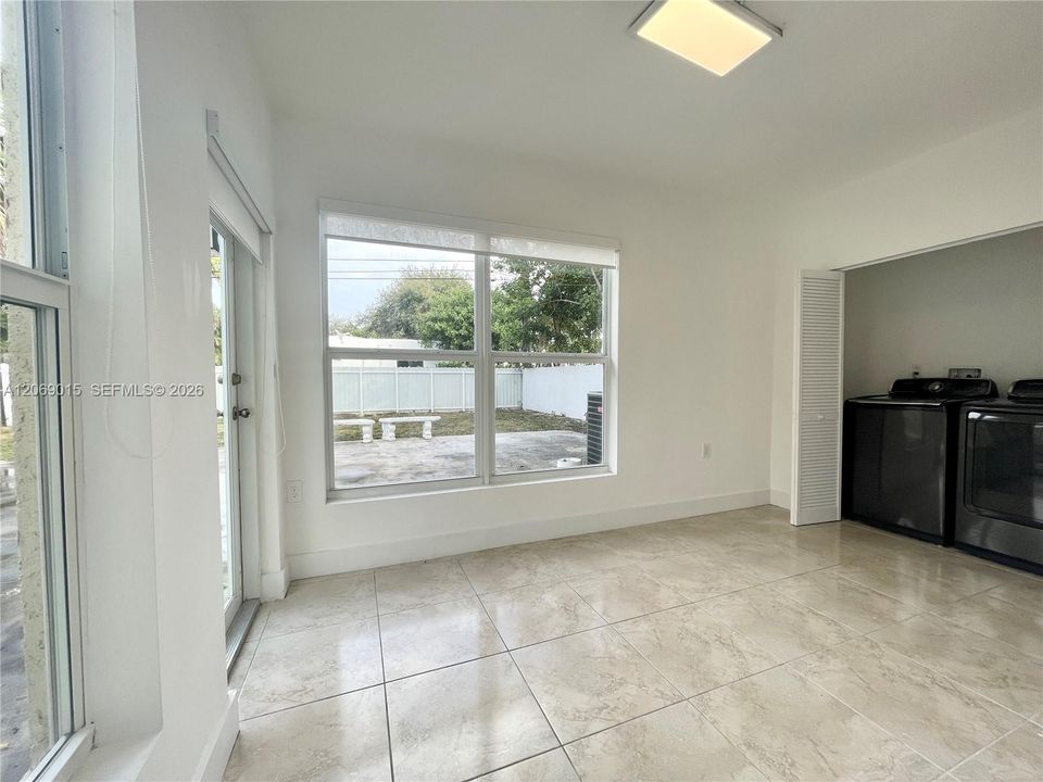 Bonus room with full size W/D and access to backyard