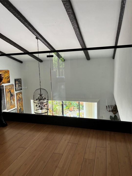 Glass railing on landing
