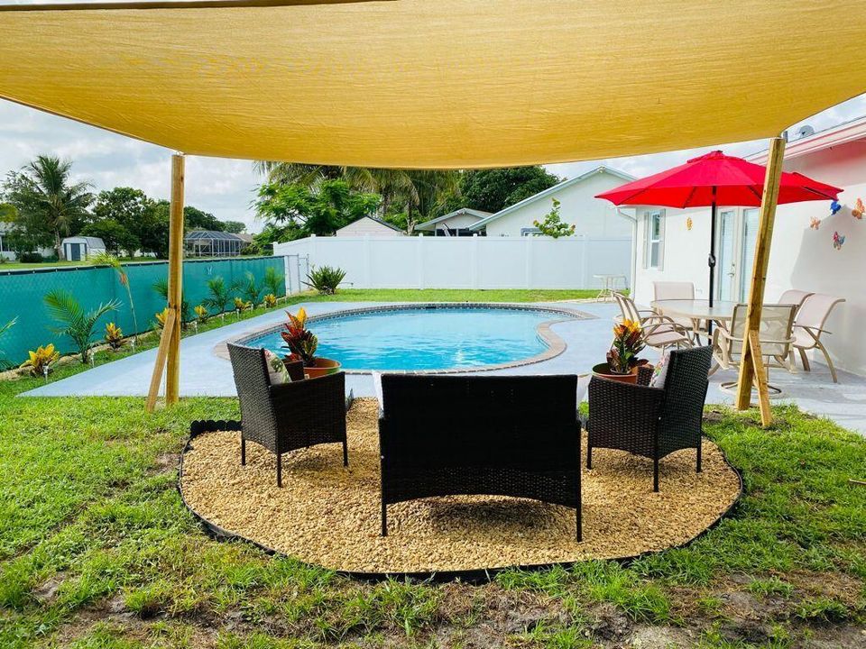Boca Pool sitting area from behind