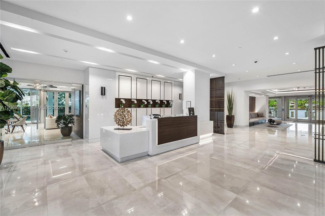 An elegant reception area with dedicated concierge service provides a welcoming and attentive arrival experience.