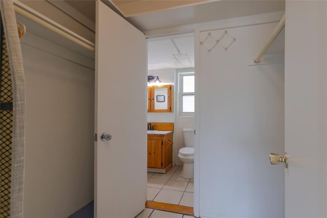 Walk thru closet to Bathroom