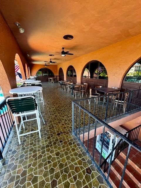 Restaurant and event balcony overlooking the pool and tennis courts