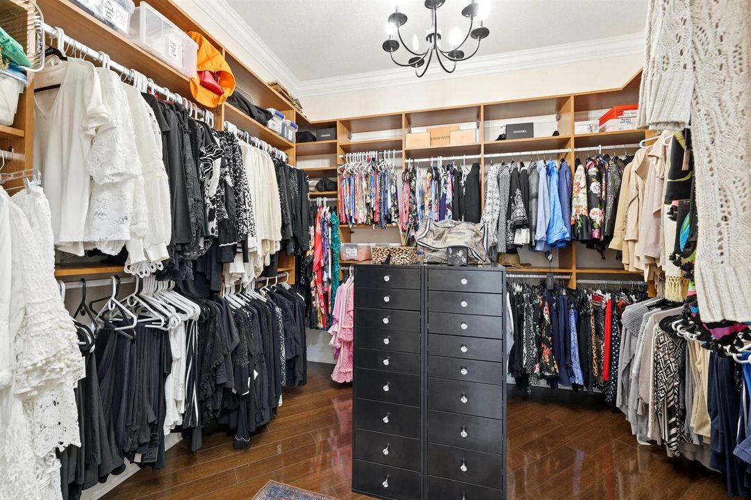 One of 3 Master Walkin Closets