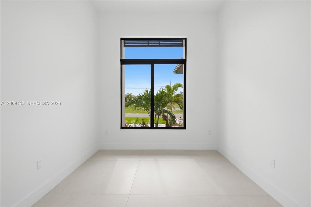 Versatile private office with abundant natural light, ideal for working from home.