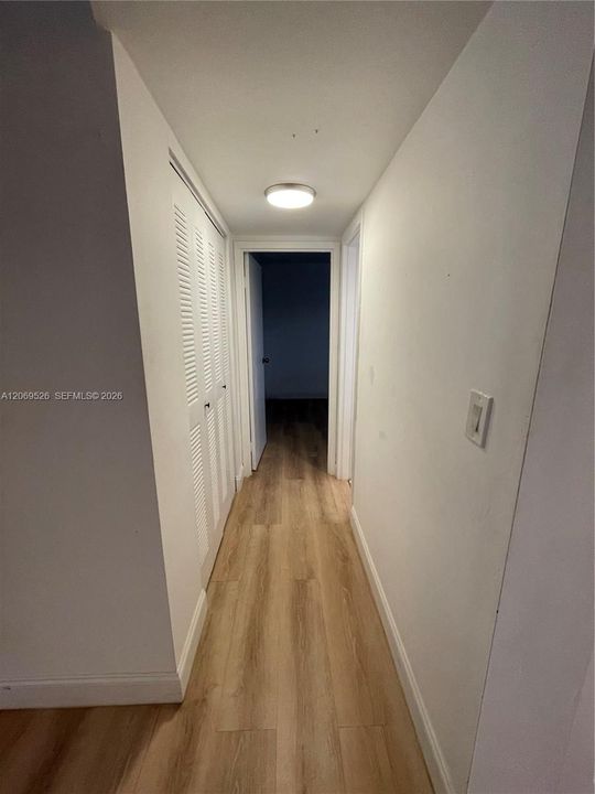 Hall way and closets to Guest bedroom