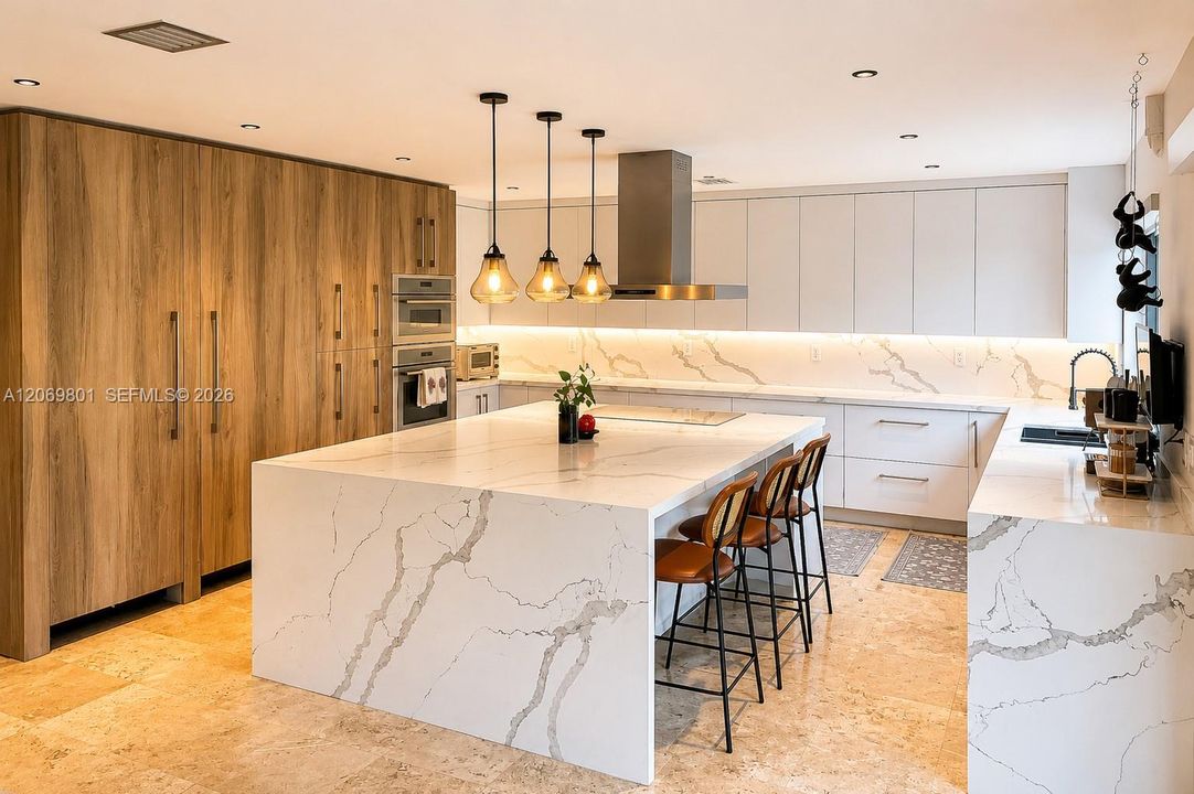 A true showpiece, this custom chef's kitchen was designed with no expense spared. Highlights include top-of-the-line Thermador appliances, separate full-size Miele refrigerator and freezer units, a spectacular oversized waterfall island that comfortably seats six, extensive custom cabinetry with abundant storage, quartz countertops and full-height backsplash, designer pendant lighting, and expansive prep space. Beautifully designed for both serious cooking & effortless entertaining, centerpiece of the home