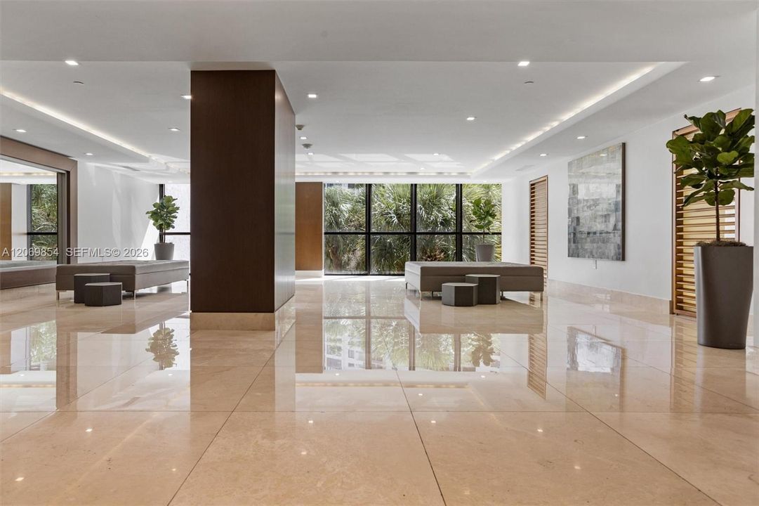 Step into luxury as you enter this beautifully remodeled lobby, designed to impress with its modern elegance and sophisticated ambiance. This grand entrance sets the tone for upscale living. Enjoy the convenience and security of a 24-hour concierge service, ensuring personalized assistance and peace of mind around the clock. Thoughtfully designed with contemporary finishes and stylish details, this welcoming space offers the perfect blend of comfort and exclusivity