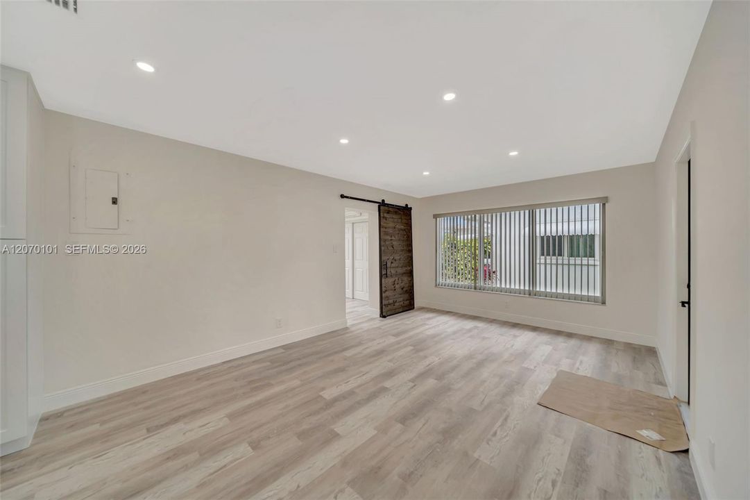 Dining area showing entry to third room (Study)