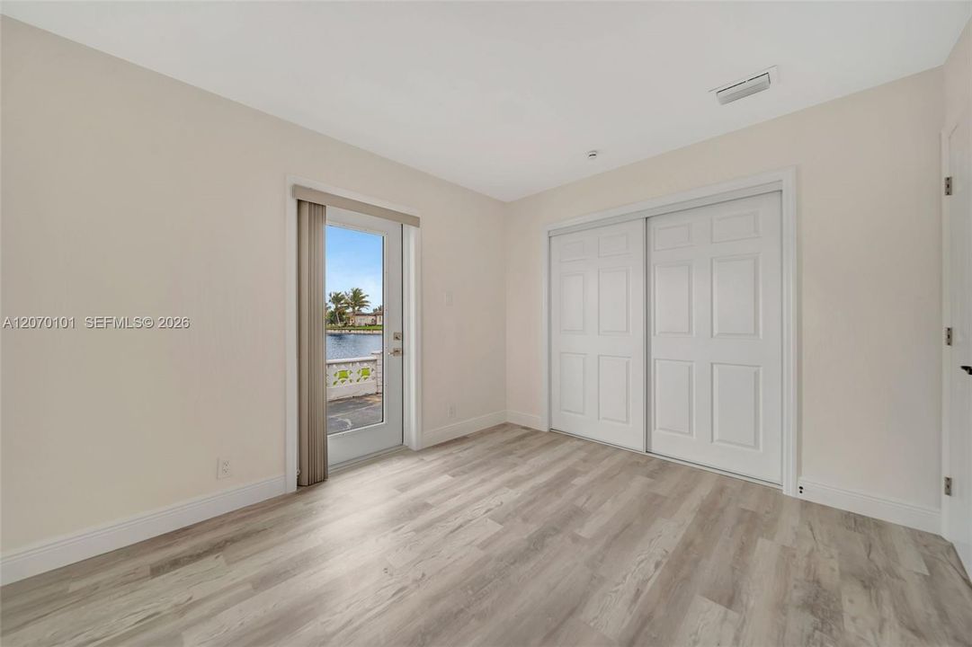 Private door to lakefront patio — feature shot