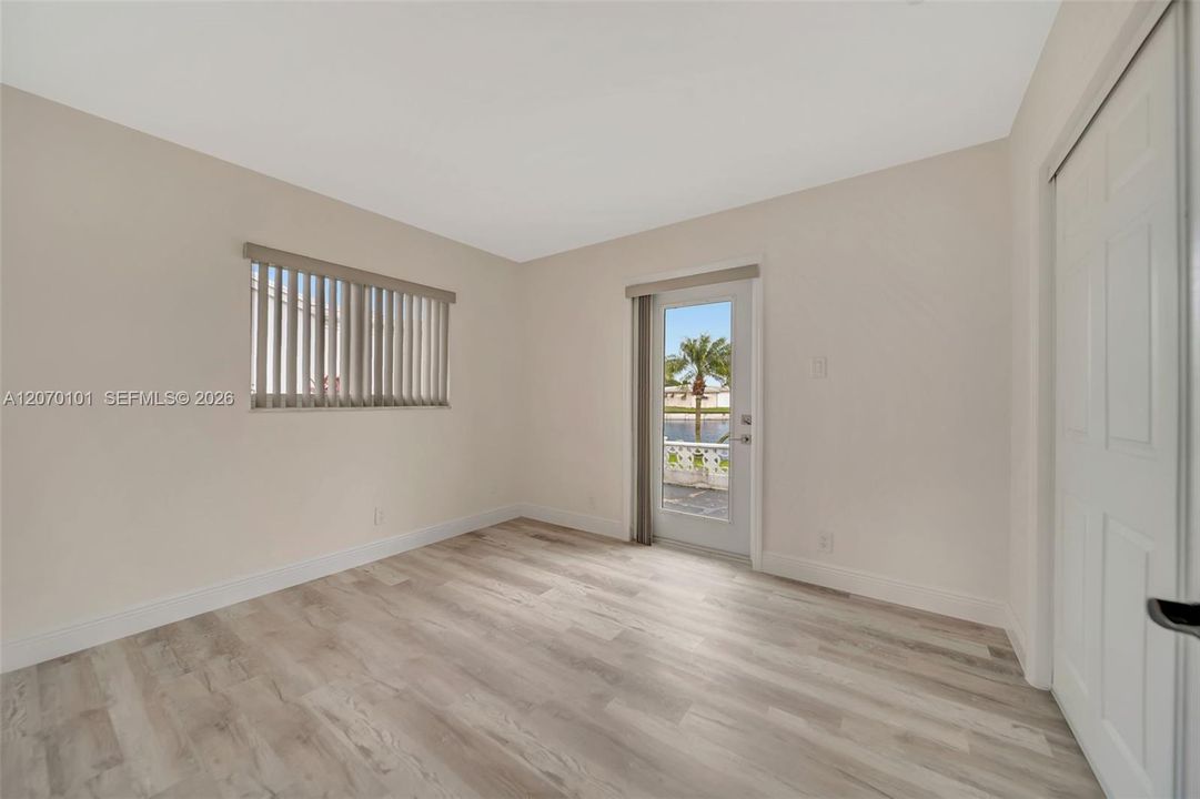Private door to lakefront patio — feature shot