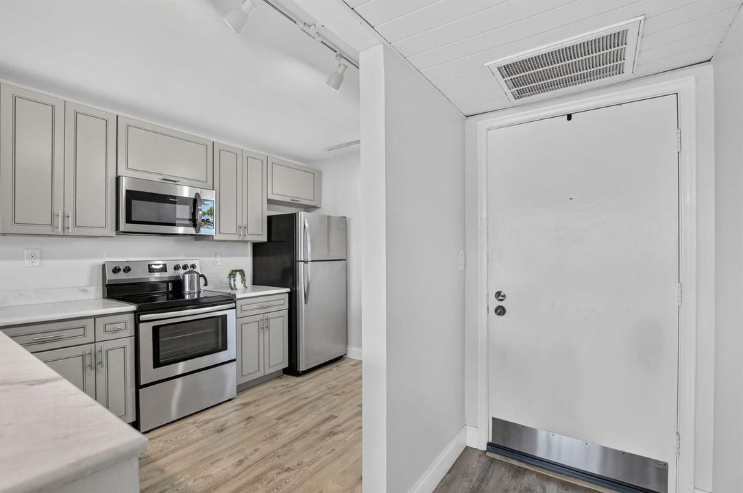 Front Door/Kitchen