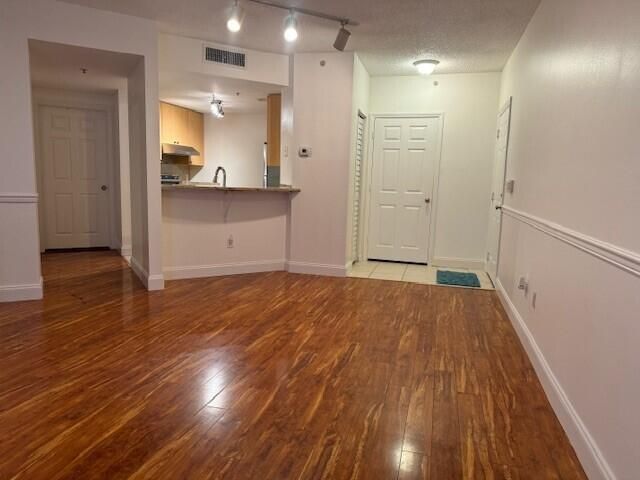 CP view of kitchen and enterance