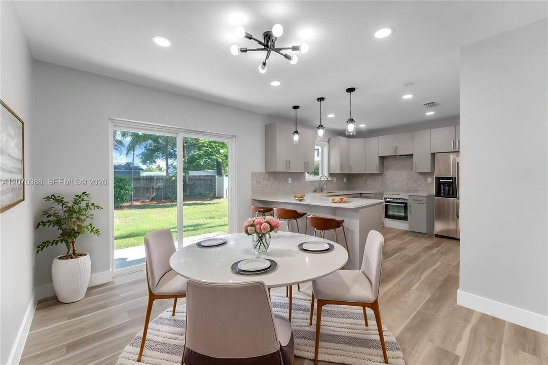 Light and Bright Staged Dining Area Open Concept
