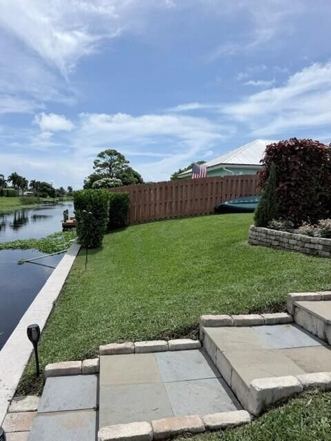 Right back side yard with canal