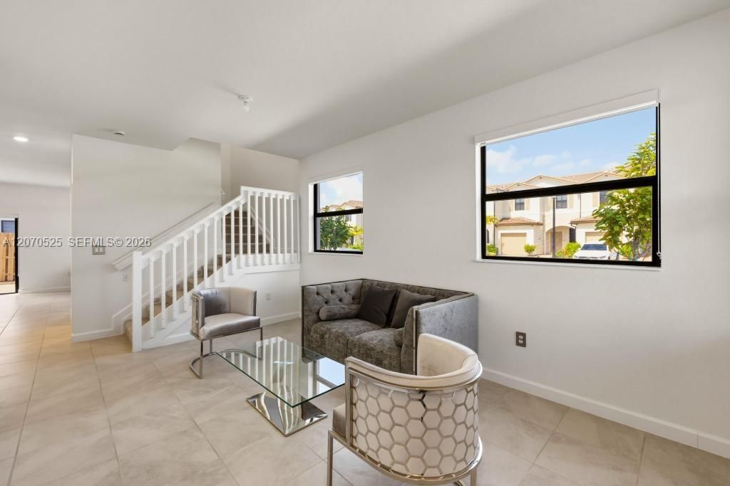 There's room here to create both living and dining areas while still keeping everything comfortable and open.