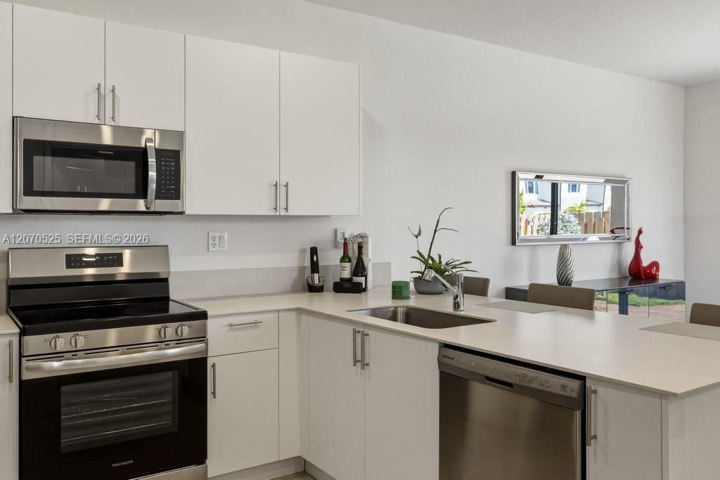 You have white cabinetry, generous counter space.