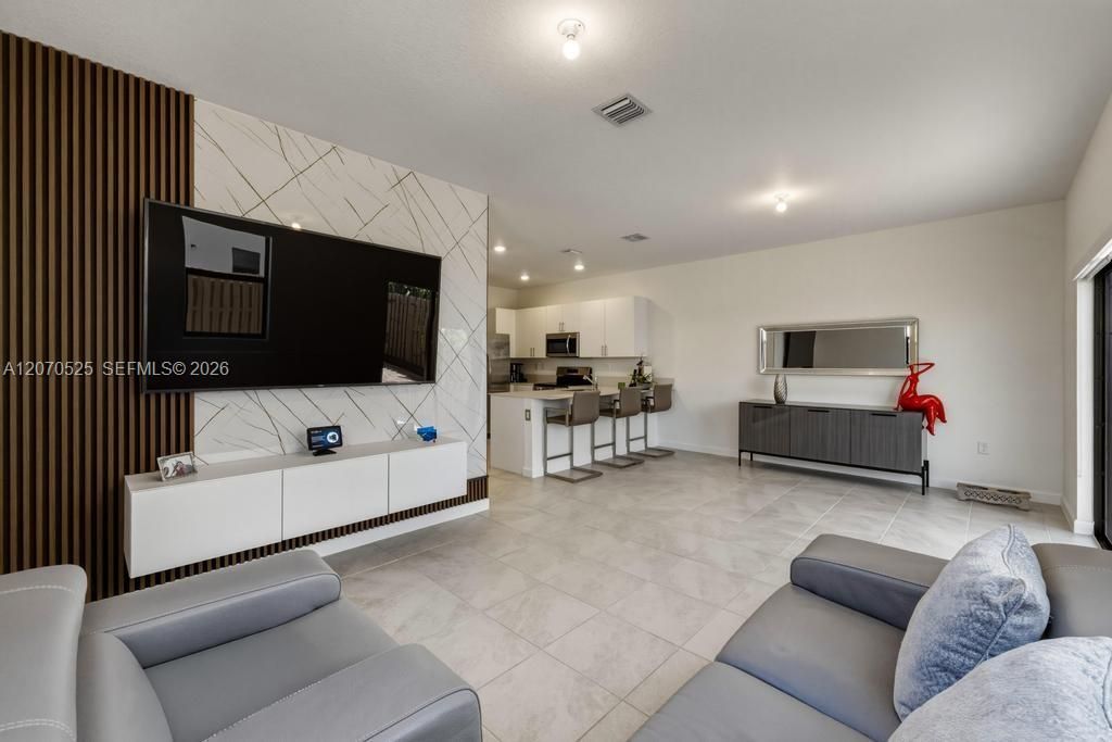 And we love the contemporary TV feature wall.