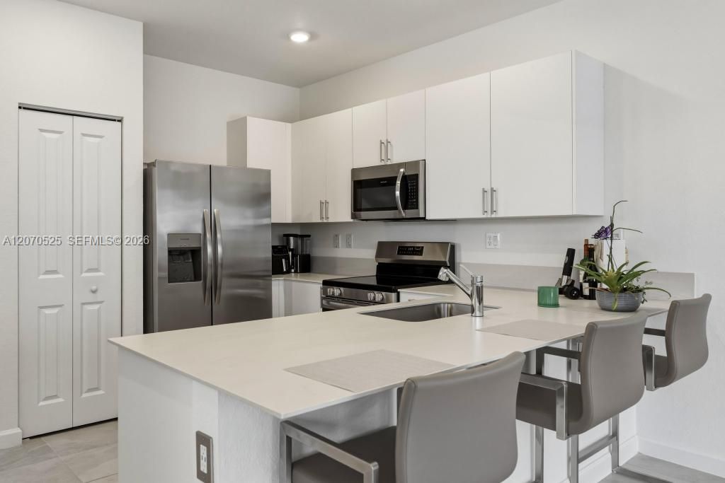 The kitchen is modern, bright and designed to be part of the home rather than hidden away from it.