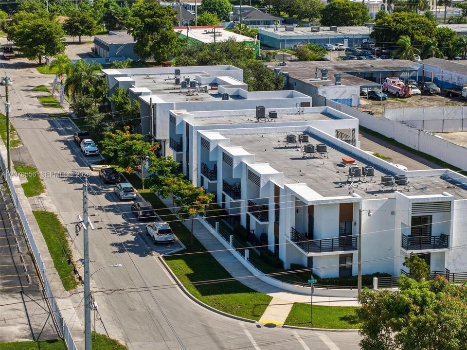 From up here, you can really appreciate the community, the surrounding neighborhood, and the open green spaces just steps from home.