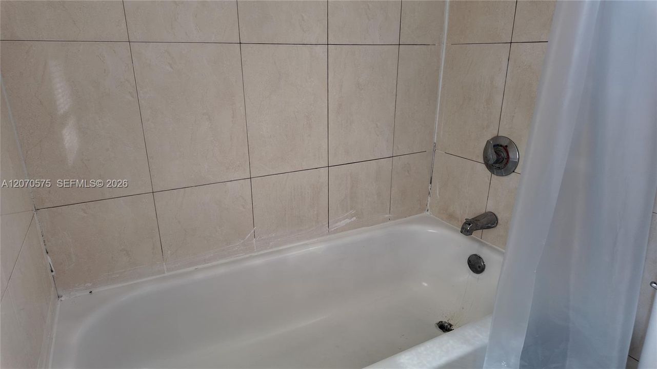And a bathtub shower combination.