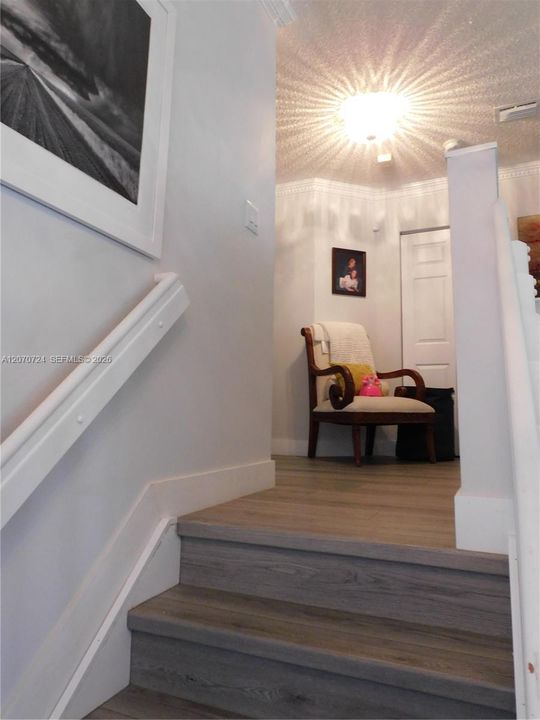 Stair landing to 2nd level.