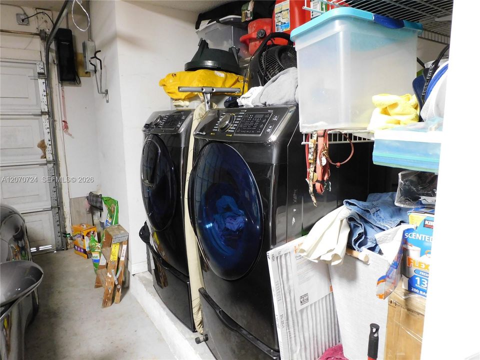 Full Size Front Loader Washer and Dryer.