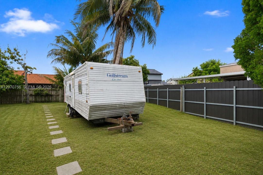 RV on the side of the yard