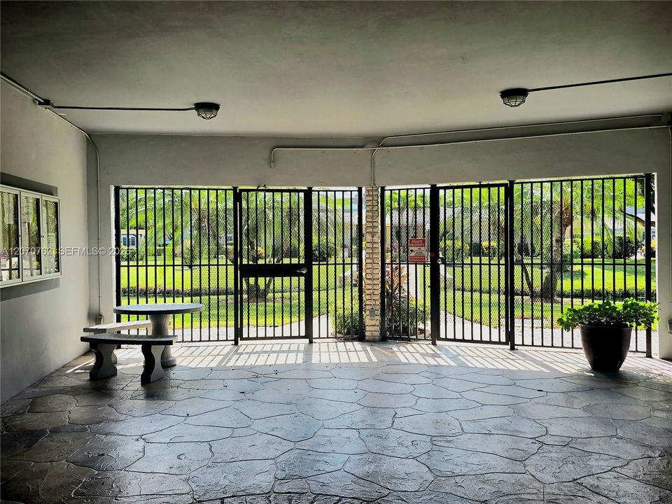 Entry area with mailboxes and access to grounds and amenities