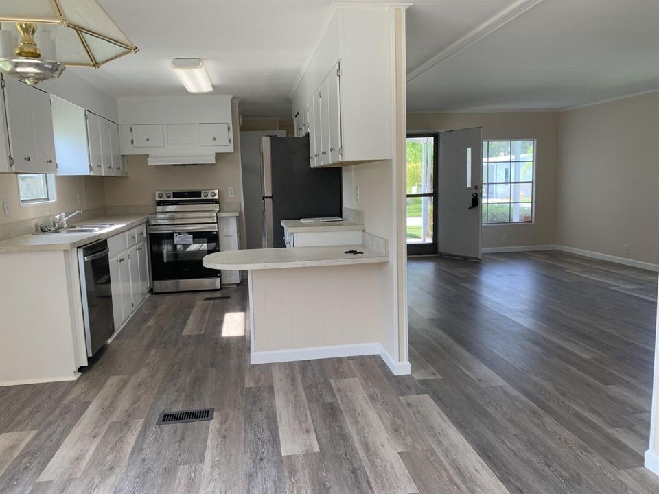 Dining to Kitchen and Living Room