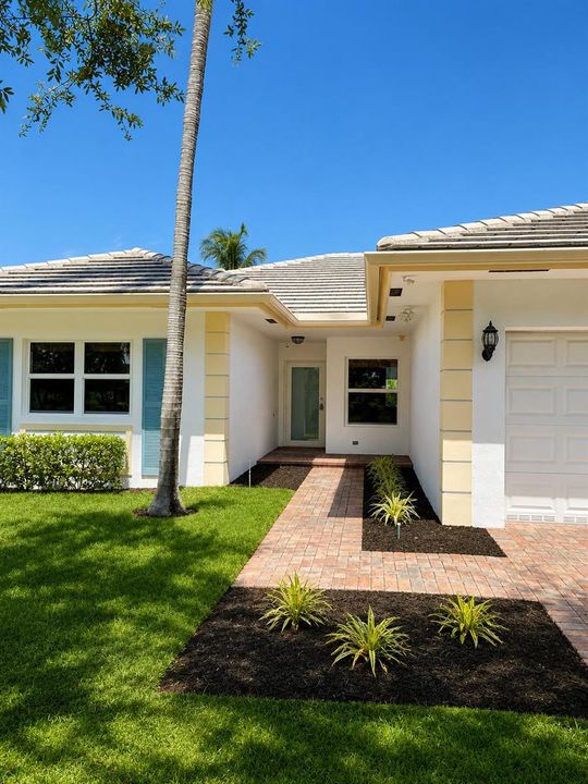 sunny_tropical_suburban_home_entrance