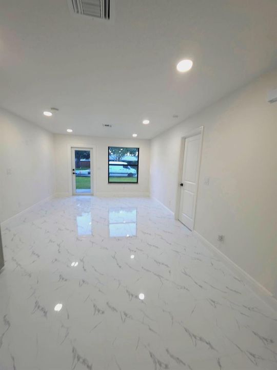 8001-hibiscus-road-03-living-room-enhanc