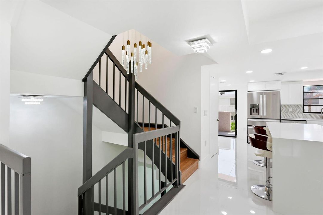 Stairs off kitchen