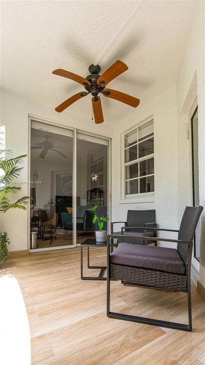 Another view of the terrace showing the ceiling fan.