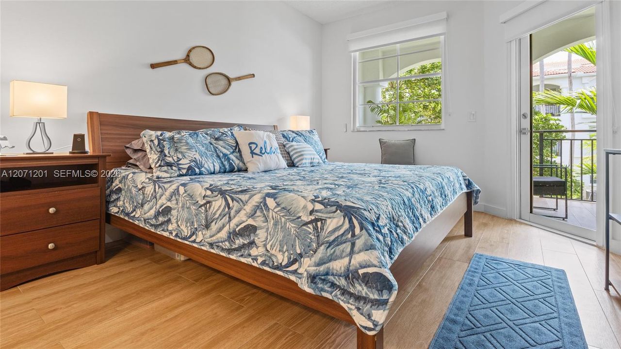Master bedroom with a King size bed.